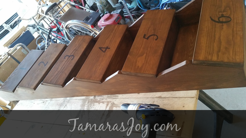 How to build your very own mitten storage! It cleans up the mudroom & helps the kids keep things organized in a simple way. Tamarasjoy.com