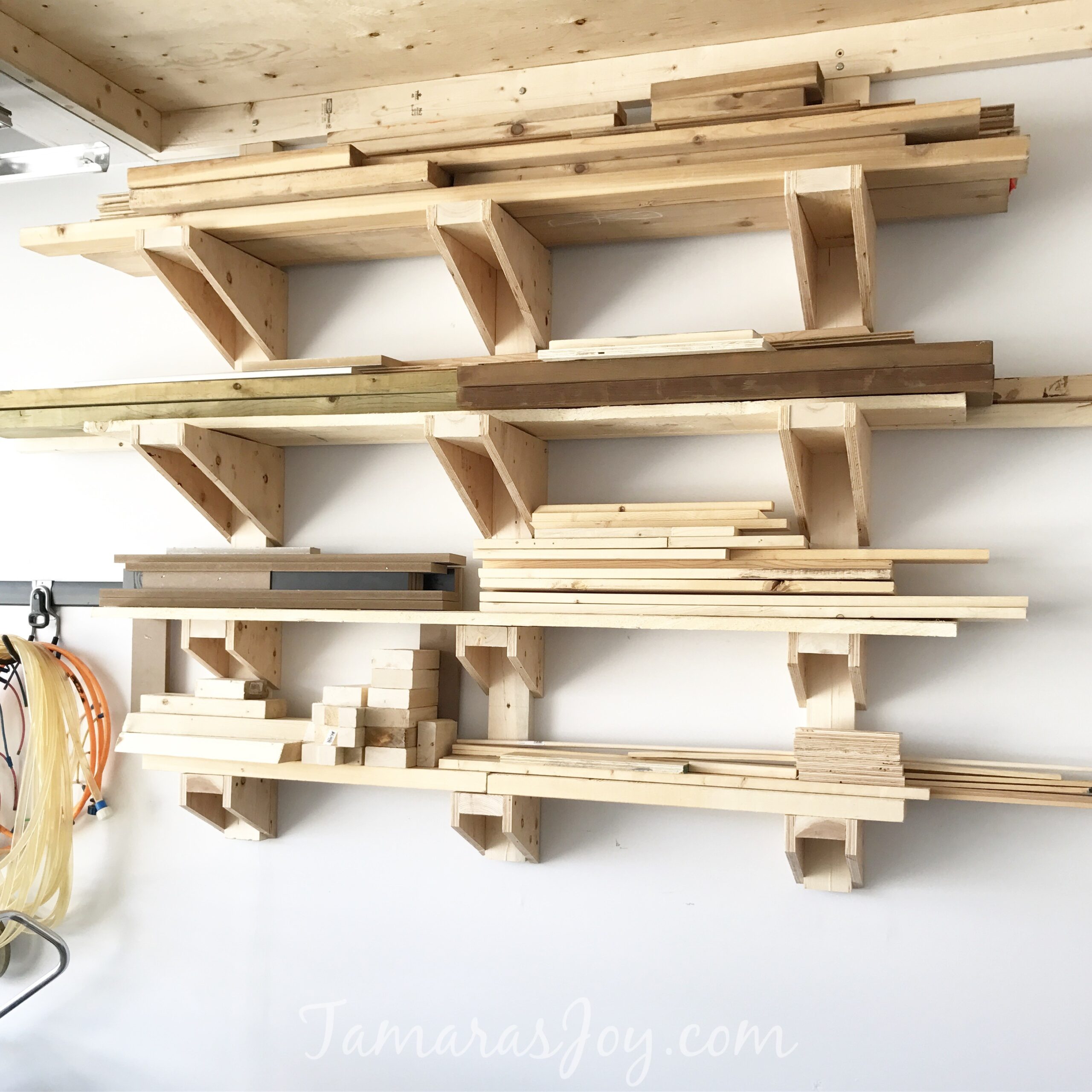 A Simple Diy Garage Lumber Rack That You Can Build Tamara S Joy