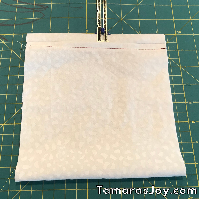 Iron this un sewn edge