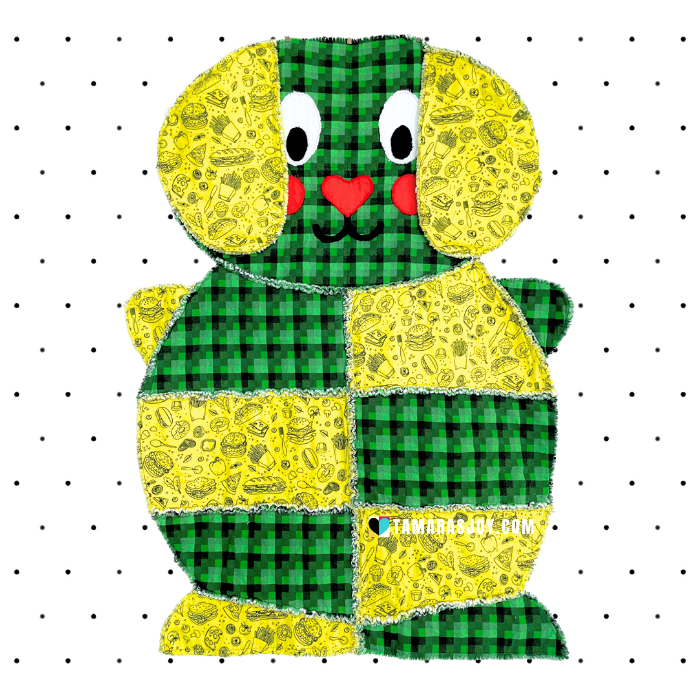 Patchwork dog design with green and yellow pattern on a white background